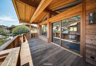 „Ankommen. Durchatmen. Bleiben. – Ihr Chalet in Aurach“