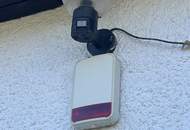 Haus in Grünruhelage mit offener Terrasse, Balkon und Garage