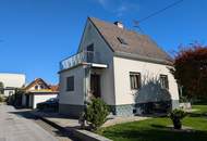 Einfamilienhaus in ruhiger Siedlungslage mit Carport und Garage