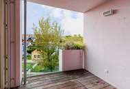 Ruhelage Innenhofidylle– Loggia &amp; Gartenblick