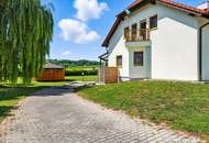 High-end living in a peaceful green location! A feel-good retreat in a class of its own: tradition meets state-of-the-art comfort!