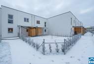 Familienglück im Grünen – nachhaltige Reihenhäuser am Kanal