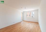 Hochwertige Erstbezugs-Wohnung mit großem Hof-Balkon und Küche nahe Schönbrunn!