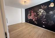 Großzügiges Penthouse mit Garten und Schwimmteich