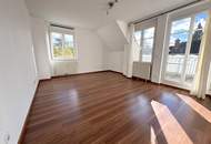 Ruhige 2-Zimmer Wohnung mit Grünblick, Terrasse + 2 Garagenplätzen