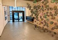 Urbanes Arbeiten im Industrial-Chic: Exklusives Büro mit Open-Space-Flair und Innenhof-Balkon