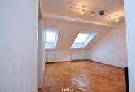 Charmante Dachgeschosswohnung mit Balkon und Lift in ausgezeichneter Lage
