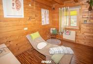 Naturnah wohnen mit vielfältigen Nutzungsmöglichkeiten – charmantes Holzblockhaus mit Wintergarten und Sauna in Stratzing
