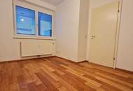 Schöne 2-Zimmer-Gartenwohnung mit Terrasse und TG-Parkplatz