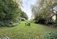 Exklusives Dachgeschoß-Juwel in Turmvilla mit großem Gartenanteil