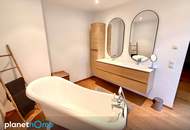 Wohnluxus im Zentrum – große Sonnenterrasse, Garage und Seenähe