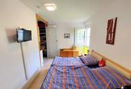 Miete. Neuwertige Wohnung mit Terrasse und Garten in Seeboden. Tiefgarage.