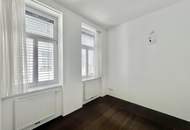 Weitblick, Ruhe & zentrale Lage – Sonnige Altbauwohnung mit Balkon