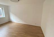 Moderne Neubauwohnung im Zentrum – mit Loggia u. Lift ! TIEFGARAGENPLATZ und KONTROLLIERTE WOHNRAUMBELÜFTUNG