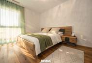NEUBAU | Hochwertige Gartenwohnung mit traumhafter Küche, Terrasse und Garage in ruhiger Grünlage!