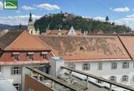 Attraktive 2-Zimmer-Stadtwohnung mit Balkon, Blick auf den Schlossberg und Stellplatz in der Tiefgarage