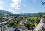 Zuhause im Grünen – Lichtdurchflutete Maisonette mit Gartenoase und Wasserblick