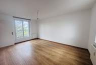 3-Zimmer-Neubauwohnung mit Westbalkon & Garage in ruhiger Grünlage