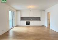 Hochwertige Erstbezugs-Anlegerwohnung mit großem Hof-Balkon und Küche nahe Schönbrunn!