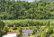 Gartenparadies in einzigartiger Naturlage: Gemütlicher Bungalow mit Wintergarten direkt an der Drau in Lavamünd