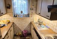 Bungalow mit Garage und großem Garten in Badener Grünruhelage!