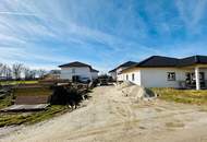 Neue Einfamilienhäuser in Weidenholz