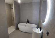 Erstbezug -Gartenwohnung! 3 Zimmer mit 2 Balkonen &amp; großem Privatgarten