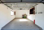 Einfamilienhaus mit Einliegerwohnung, Garage, Carports und Ausblick!