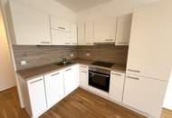 Günstige Neubauwohnung mit MEGA-SÜD-BALKON (11,64m²) nahe Akademiepark