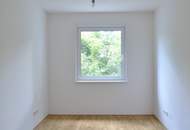 Sonnige und freundliche Neubauwohnung – 3 Zimmer mit Balkon und Gartenmitbenützung!