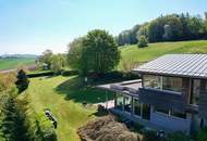 Nachhaltig wohnen mit Erdwärme – Architektenhaus in idyllischer Grünruhelage mit Weitblick