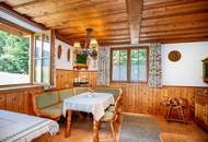 Viel Platz zum Leben – Zweifamilienhaus mit Werkstatt, Party-/ Hobbyraum & zwei Garagen in ruhiger Lage bei St. Wolfgang