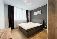 Exklusive 3-Zimmer-Dachgeschoss-Oase mit sonnigem Balkon & grünem Innenhof