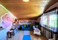 Charmantes Zweifamilienhaus mit idyllischem Naturpool