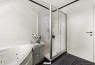 Wohnen über den Dächern von Graz mit Blick auf den Schlossberg: Exklusive Stadtwohnung mit Terrasse