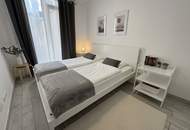 Helle 2-Zimmer-Wohnung mit großem Wintergarten (Heizkosten inkl.)