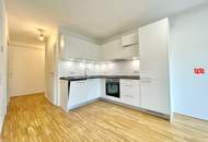 Sonniges 3 Zimmer Neubau-Eigentum Bj 2022 mit Terrasse, Tiefgaragenplatz &amp; Grünblick in schöner Ruhelage