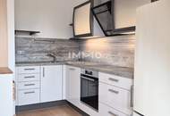 Moderne 2-Zi-DG-Wohnung mit Terrasse & Garage