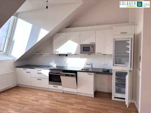 Exklusive Dachgeschosswohnung in Top Lage!