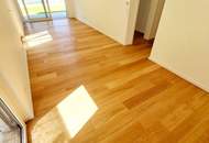 FRÜHJAHRSAKTION! Barfuß ins Gras. Direkt vom Wohnzimmer aus. Den Sommer bereits im eigenen Garten verbringen! TOP Neubauwohnung mit viel Freiraum! 3 Zimmer + Grün wohin das Auge reicht + Luftwärmepumpe!