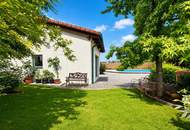 *** Ein Wohntraum mit Urlaubsgefühl: Traumhaft gepflegtes Einfamilienhaus mit Pool, Gartenidylle, Specksteinofen, Wasser-Wasserwärmepumpe mit Fußbodenheizung in Top-Lage ***