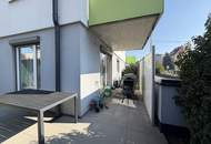 Moderne & zentrale 2-Zimmer-Eigentumswohnung mit Garten und Tiefgaragenplatz