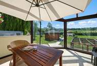 High-end living in a peaceful green location! A feel-good retreat in a class of its own: tradition meets state-of-the-art comfort!