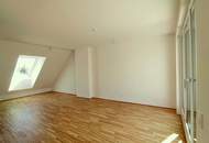 Luxus in Strebersdorf: Dachgeschoßwohnung mit großer Hofterrasse und Klimaanlage im Niedrigenergiehaus mit Fitnessraum!