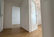 Traumhafte Terrassenwohnung in 1230 Wien – Erstbezug mit Balkon und Garage!