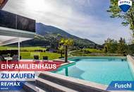 STARTPREIS! Luxuriöse Doppelhaushälfte mit Pool und Seeblick in Fuschl