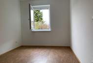 BETREUBARES WOHNEN: Schöne Gartenwohnung mit Terrasse und Tiefgaragenplatz!