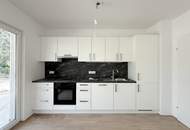 Erstbezug! Schöne Dreizimmerwohnung mit Garten