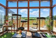 High-end living in a peaceful green location! A feel-good retreat in a class of its own: tradition meets state-of-the-art comfort!