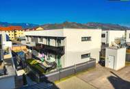 Klimatisierte Neubau-Anlegerwohnung mit 3 Zimmern, 90 m² Garten und 2 Parkplätzen in moderner Siedlung in Wasendorf